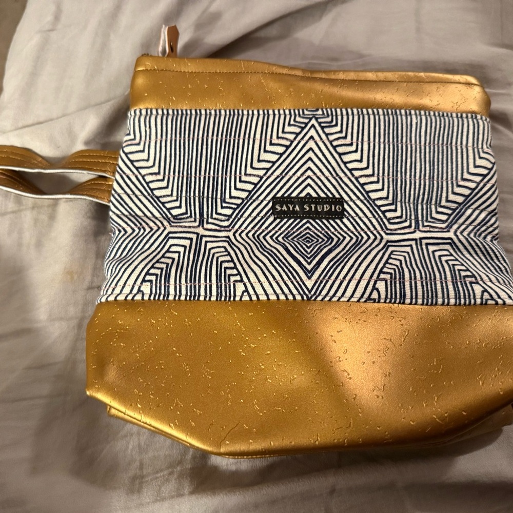 Saya Studio Gold and Black Geometric Wrist Bag